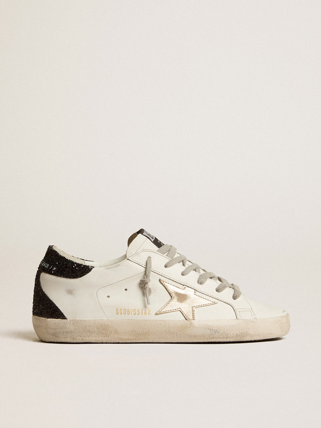 Women's Super-Star with gold star and black glitter heel tab| Golden Goose