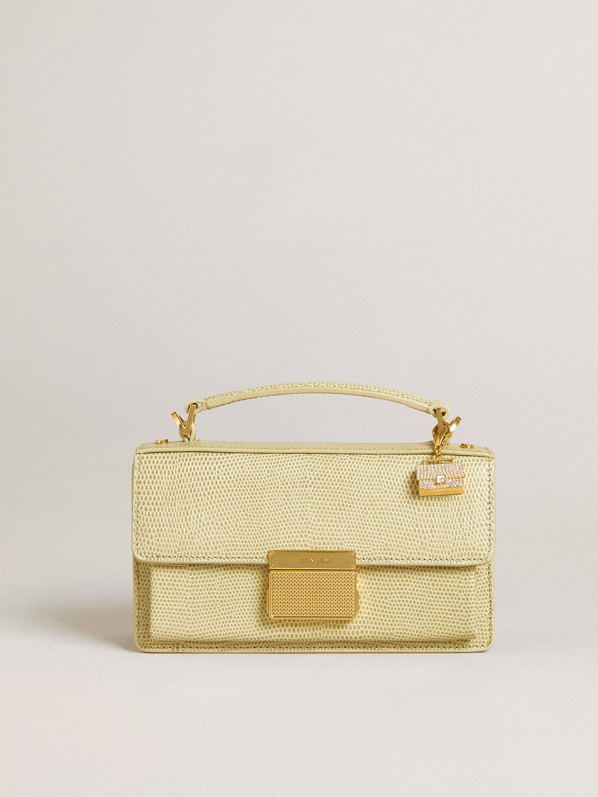 Purse-shaped charm in gold-colored brass with crystals| Golden Goose