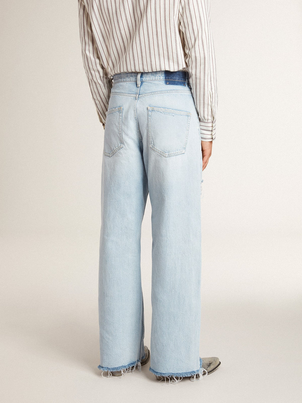 Men's pants in lived-in effect denim| Golden Goose