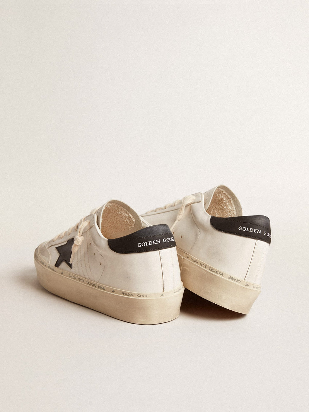 Woman's white bio-based Hi Star LTD with black bio-based star and heel tab| Golden Goose
