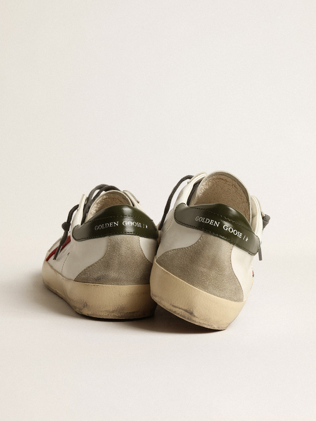 Super-Star with red suede star and green leather heel tab| Golden Goose