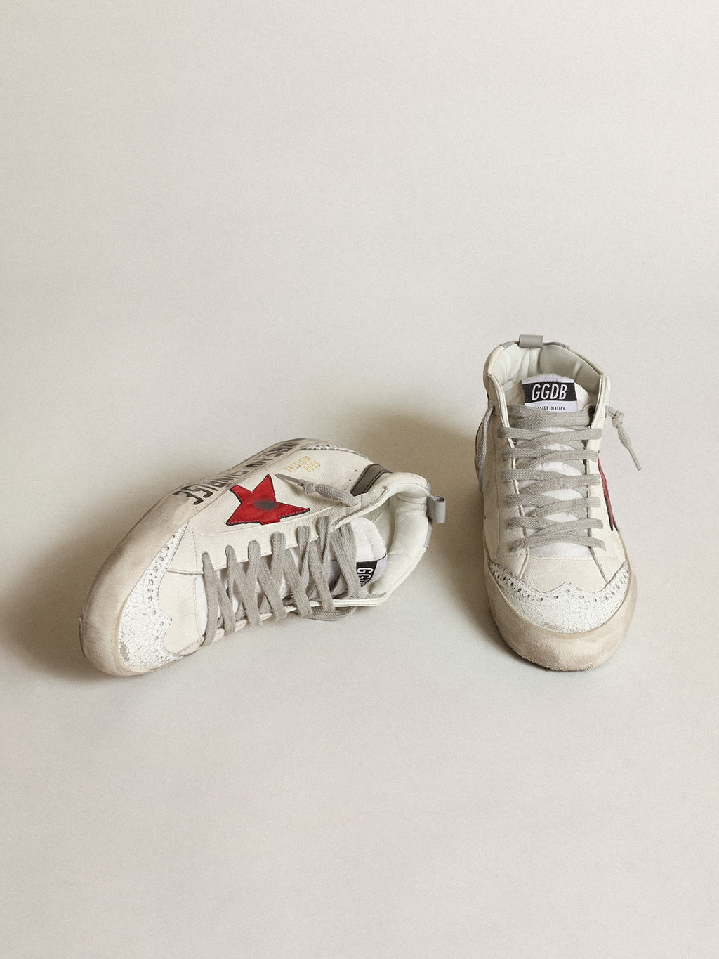 Mid Star with a pink laminated leather star and black flash| Golden Goose