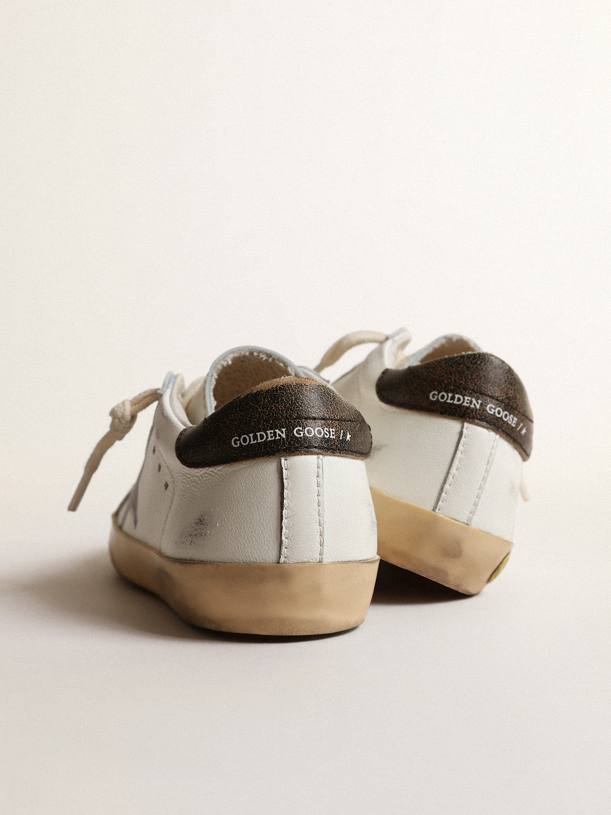 Super-Star Junior in nappa with a printed star and black heel tab| Golden Goose