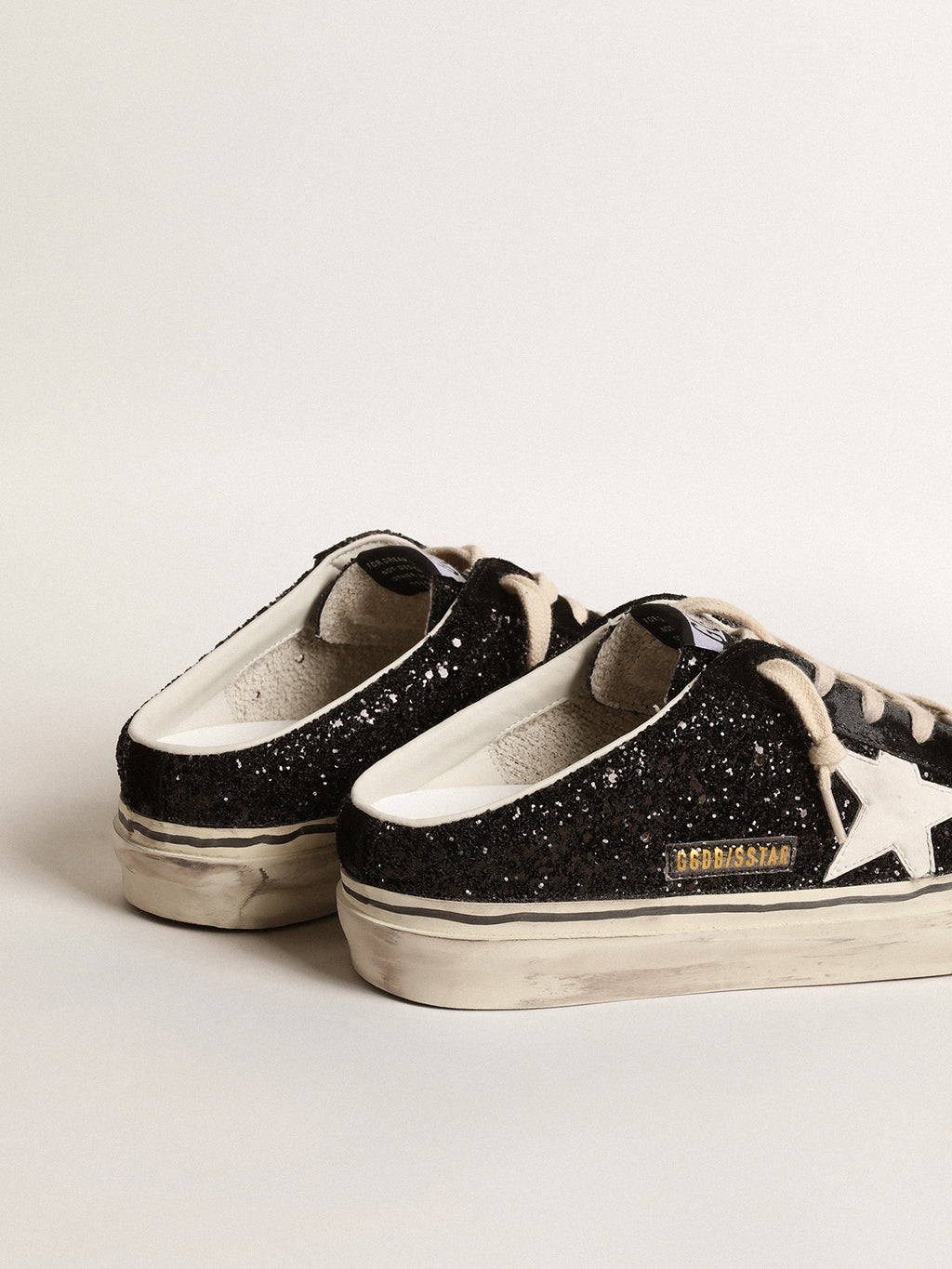 Super-Star Sabots in black glitter with white bio-based star| Golden Goose
