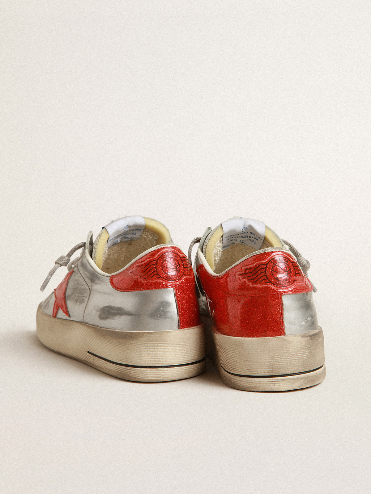 Women's Stardan in laminated leather with red glitter inserts| Golden Goose