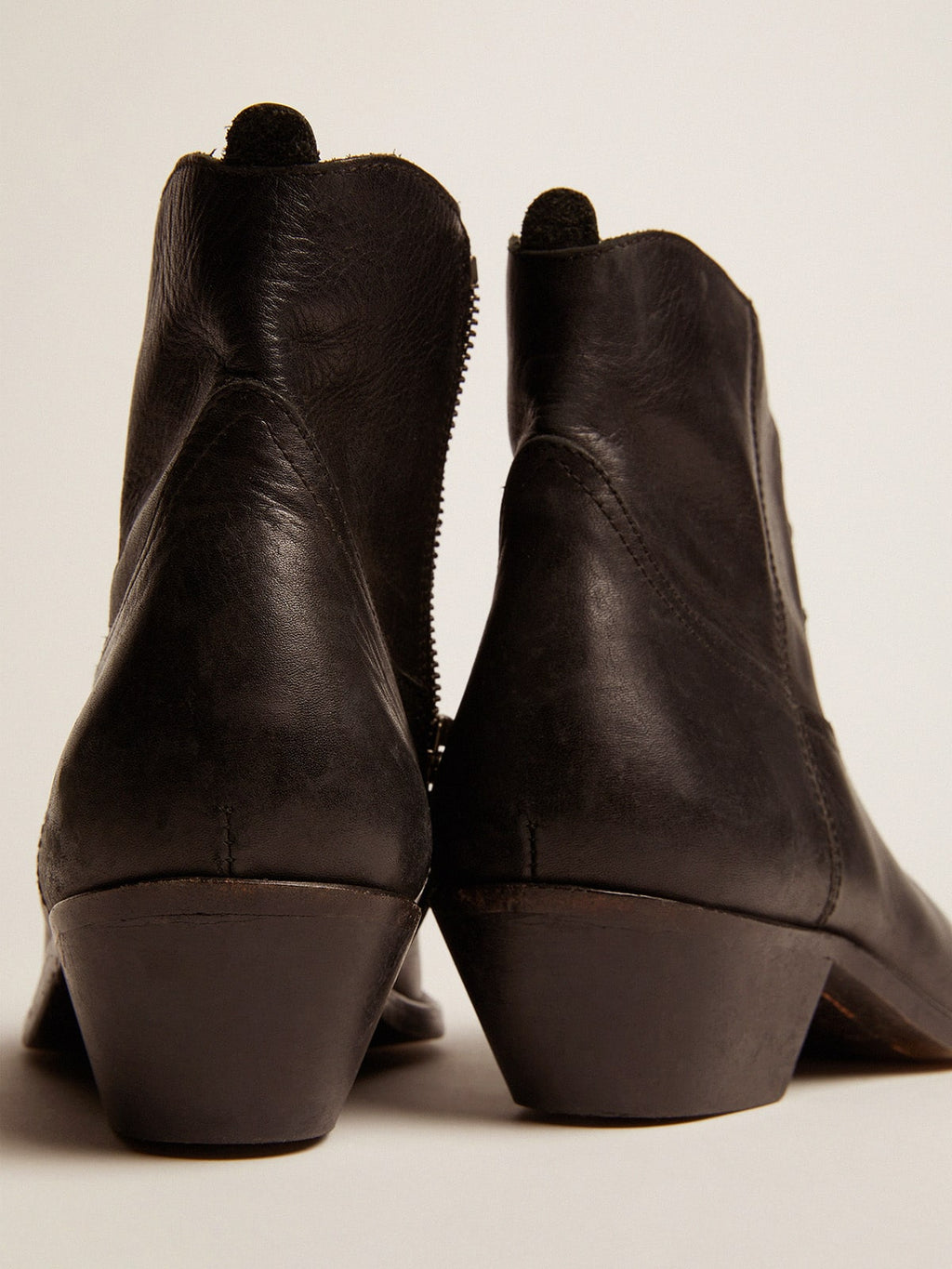 Young ankle boots in black leather with sand-colored embroidery| Golden Goose
