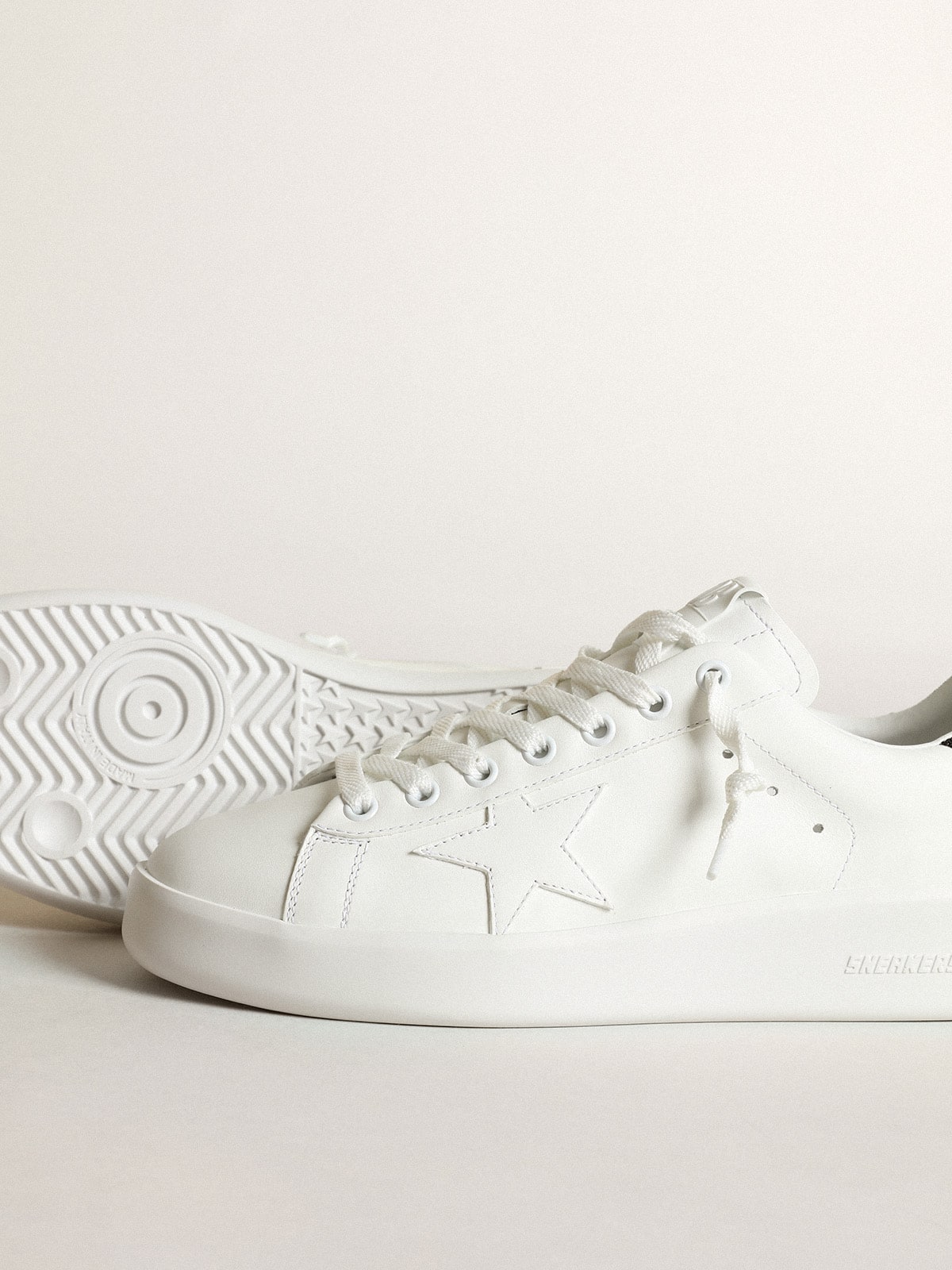 Purestar in white leather with tone-on-tone star and heel tab in black Swarovski crystals| Golden Goose