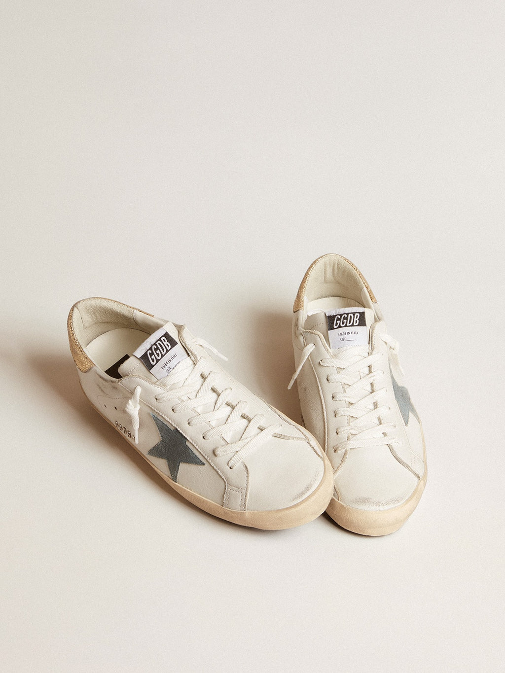 Super-Star with suede star and platinum snake-print leather heel tab| Golden Goose