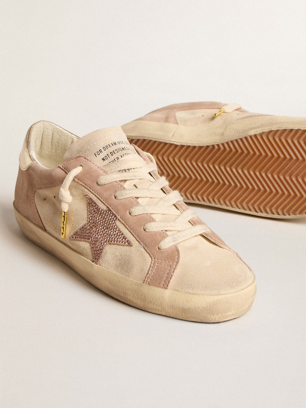 Woman's Super-Star in pale pink suede with suede star and platinum heel tab| Golden Goose