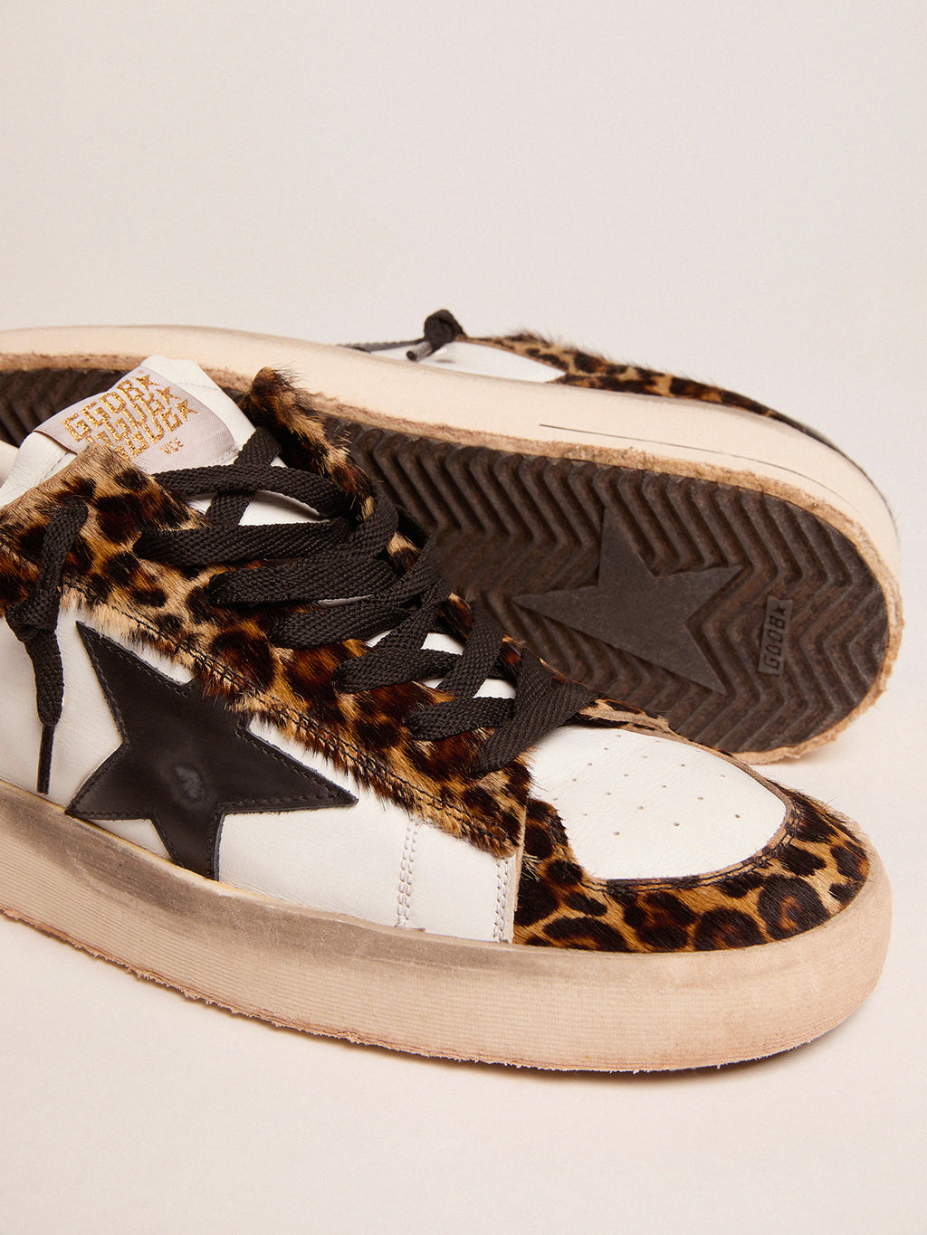 Stardan sneakers in leopard-print pony skin and black star| Golden Goose