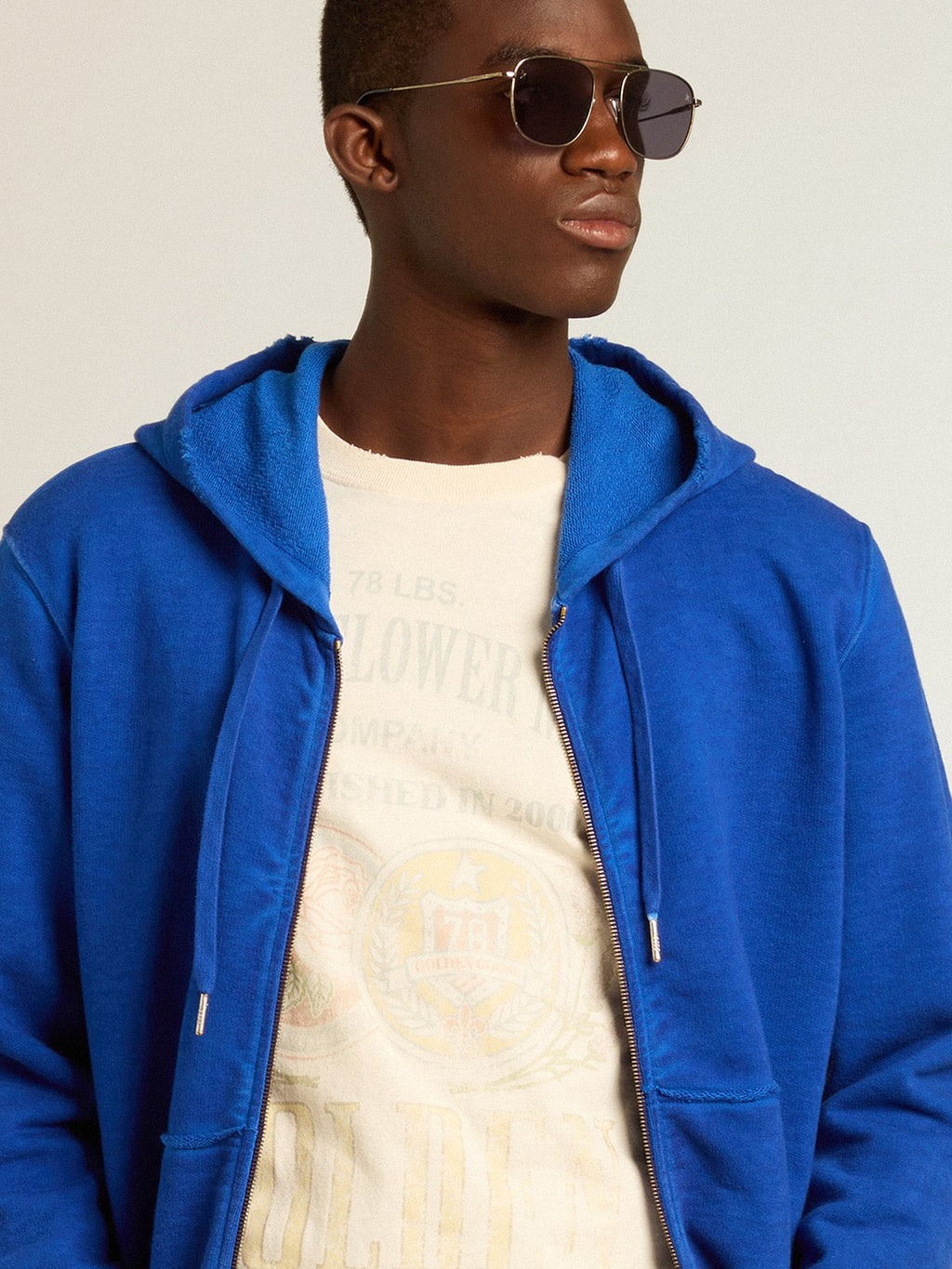Men's blue-colored hoodie with lettering on the back| Golden Goose