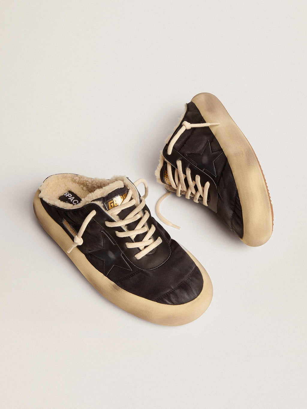Men's Space-Star Sabot shoes in quilted black nylon with shearling lining| Golden Goose