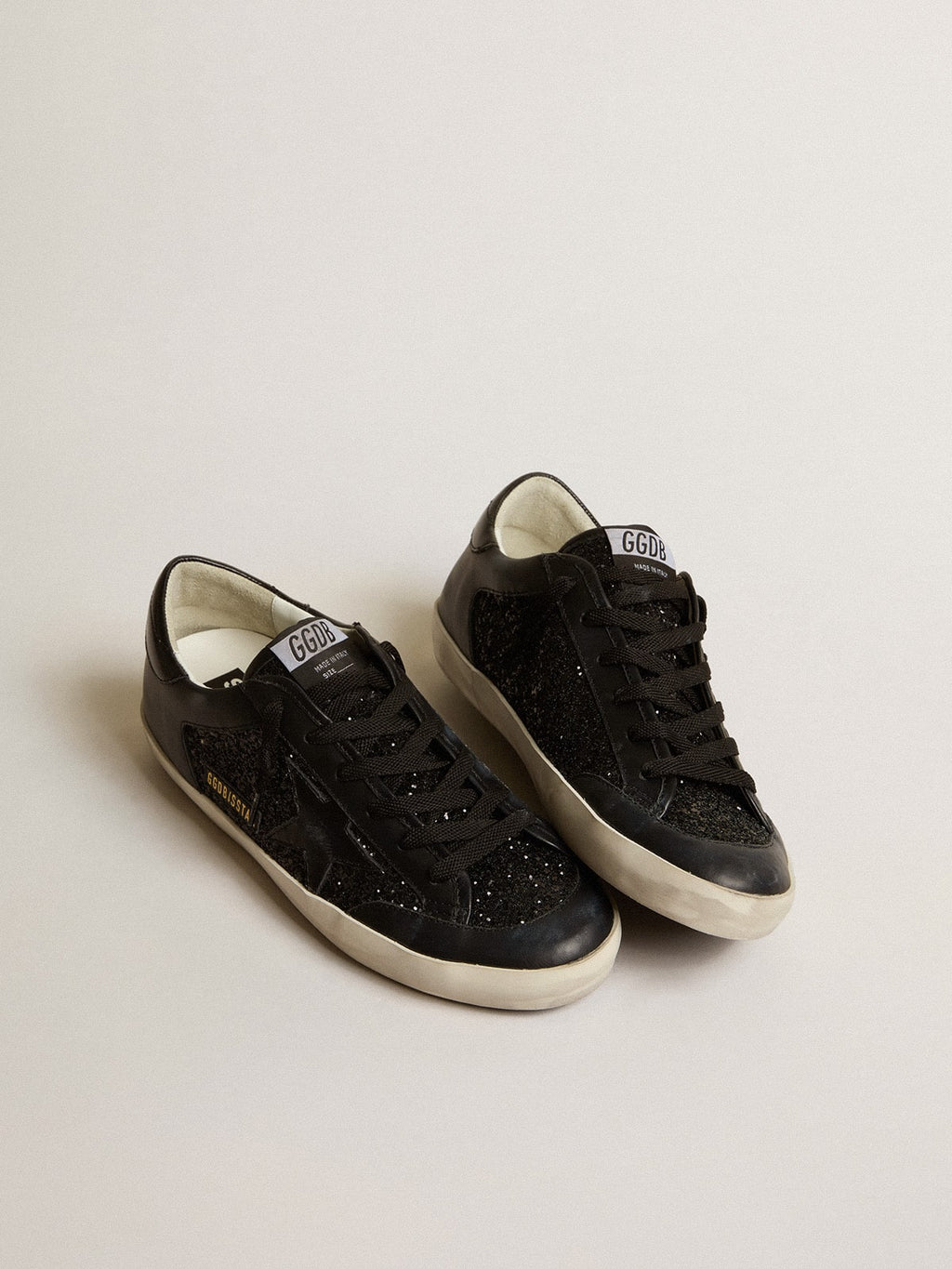 Women's Super-Star in black nappa and glitter with glossy black leather star| Golden Goose