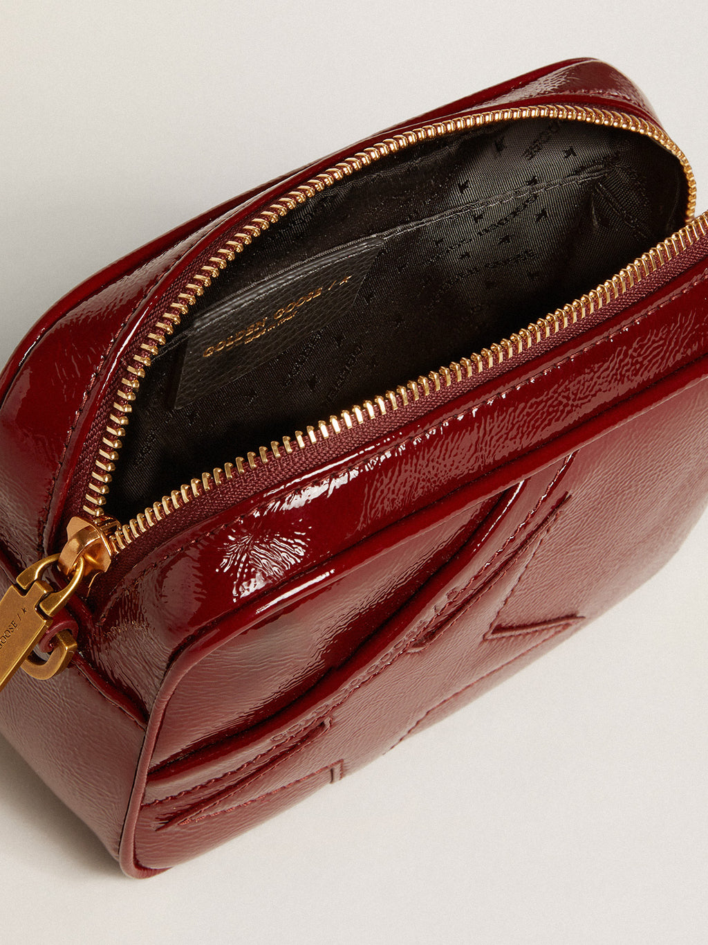 Mini Star Bag in burgundy patent leather with tone-on-tone star| Golden Goose