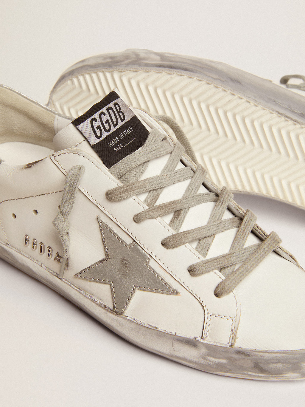 Women's Super-Star with silver sparkle foxing and metal stud lettering| Golden Goose