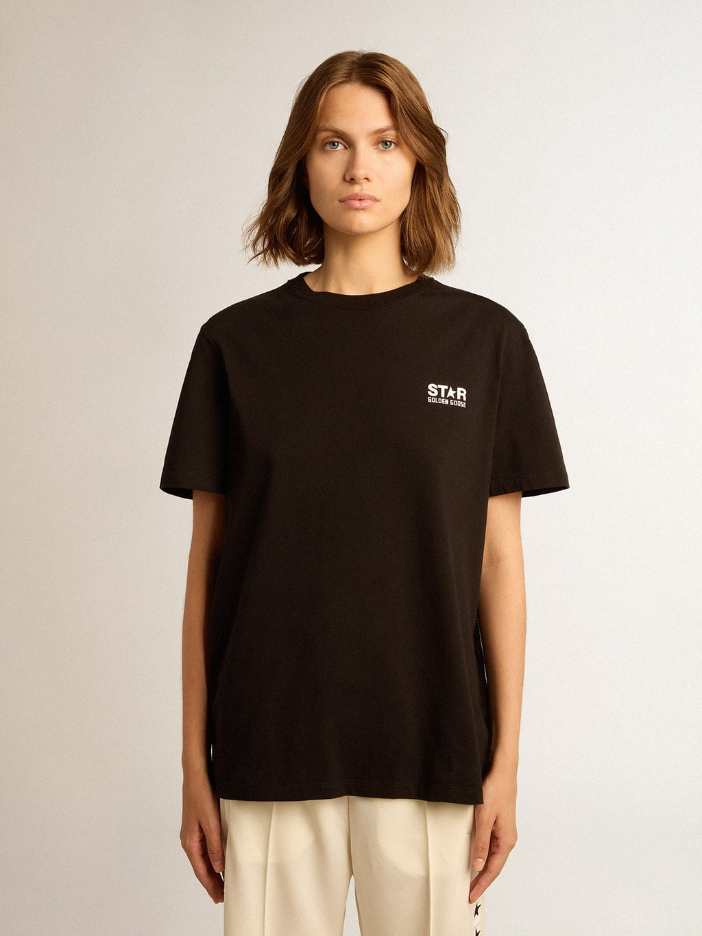 Black Star Collection T-shirt with contrasting white logo and star| Golden Goose