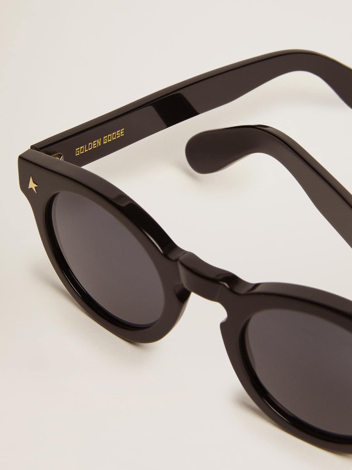 Sunframe Panthos model with black frame and gold details| Golden Goose