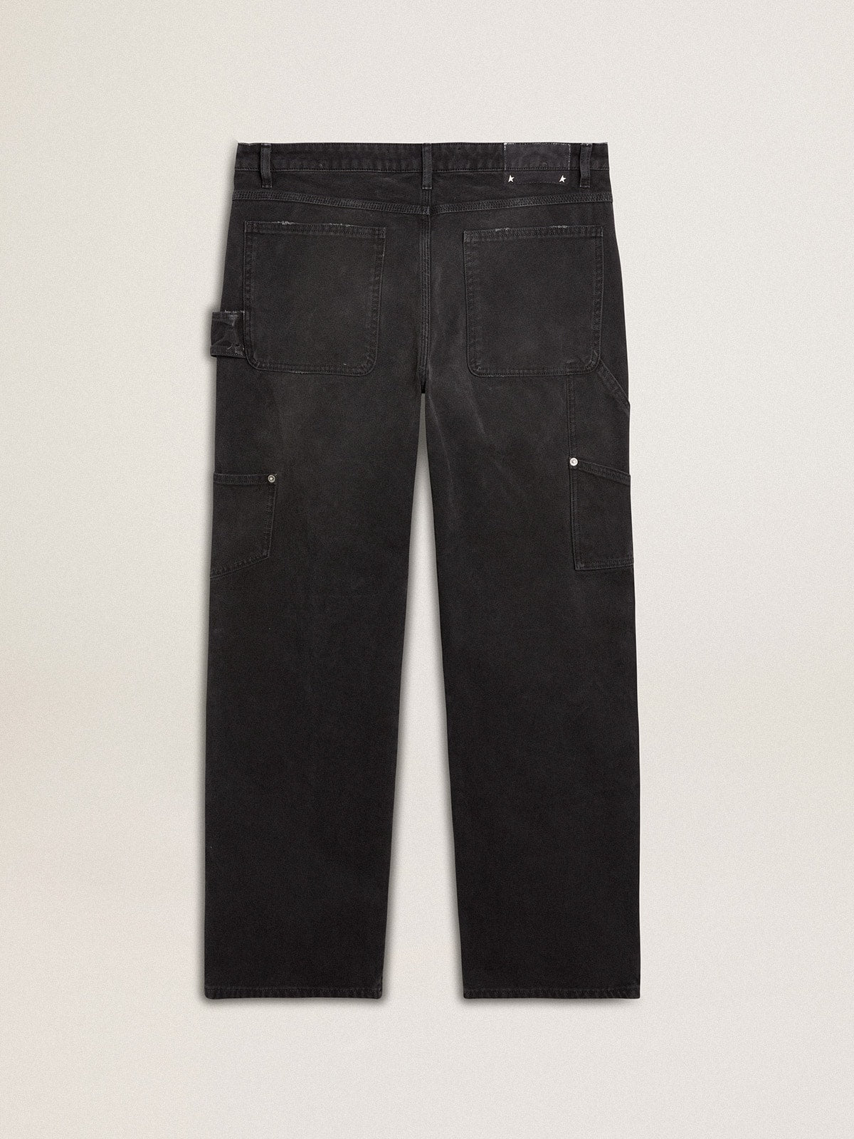 Men's distressed black cotton jeans with front patches| Golden Goose
