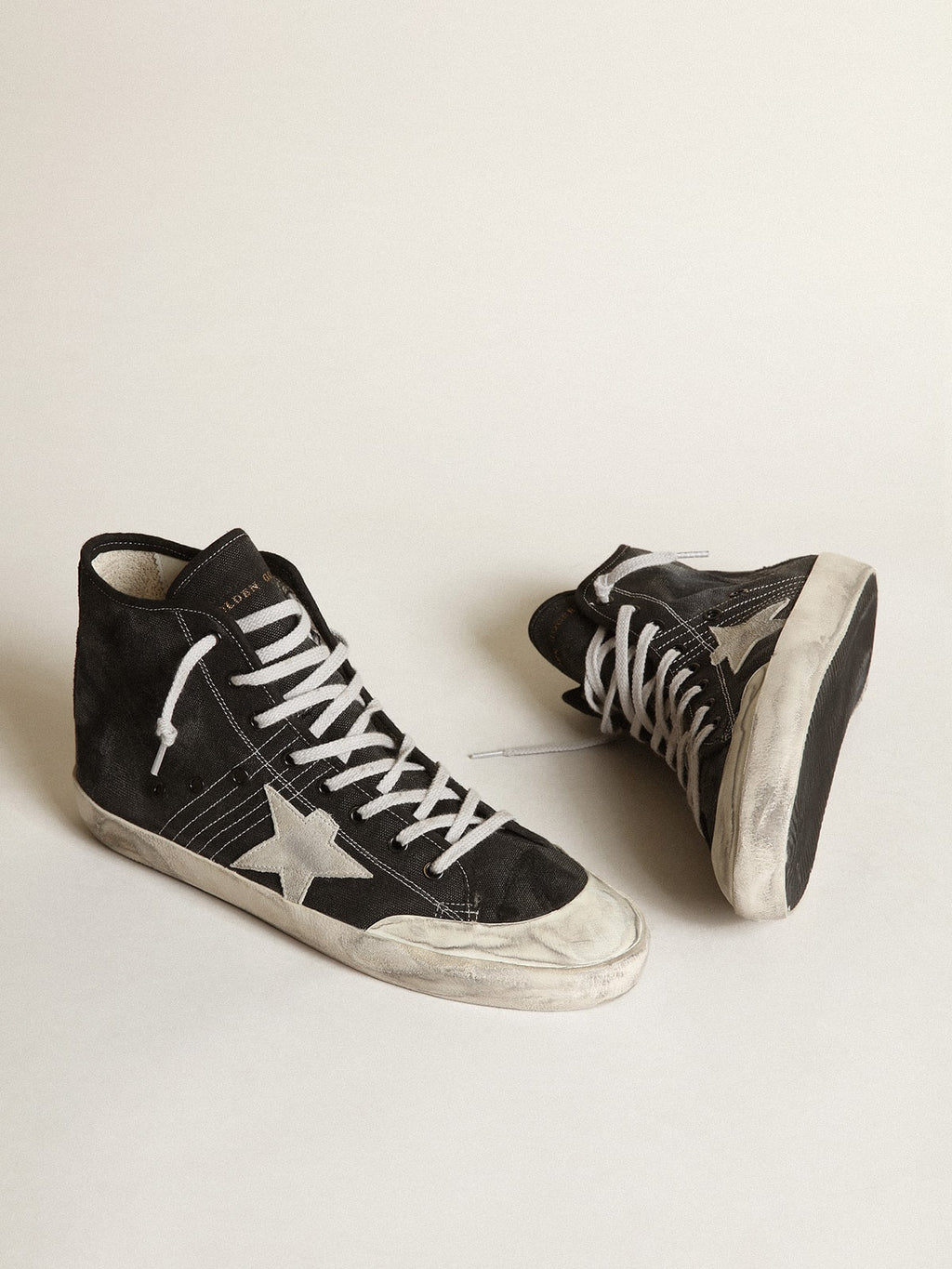 Francy Penstar in black canvas with white suede star and black suede heel tab| Golden Goose