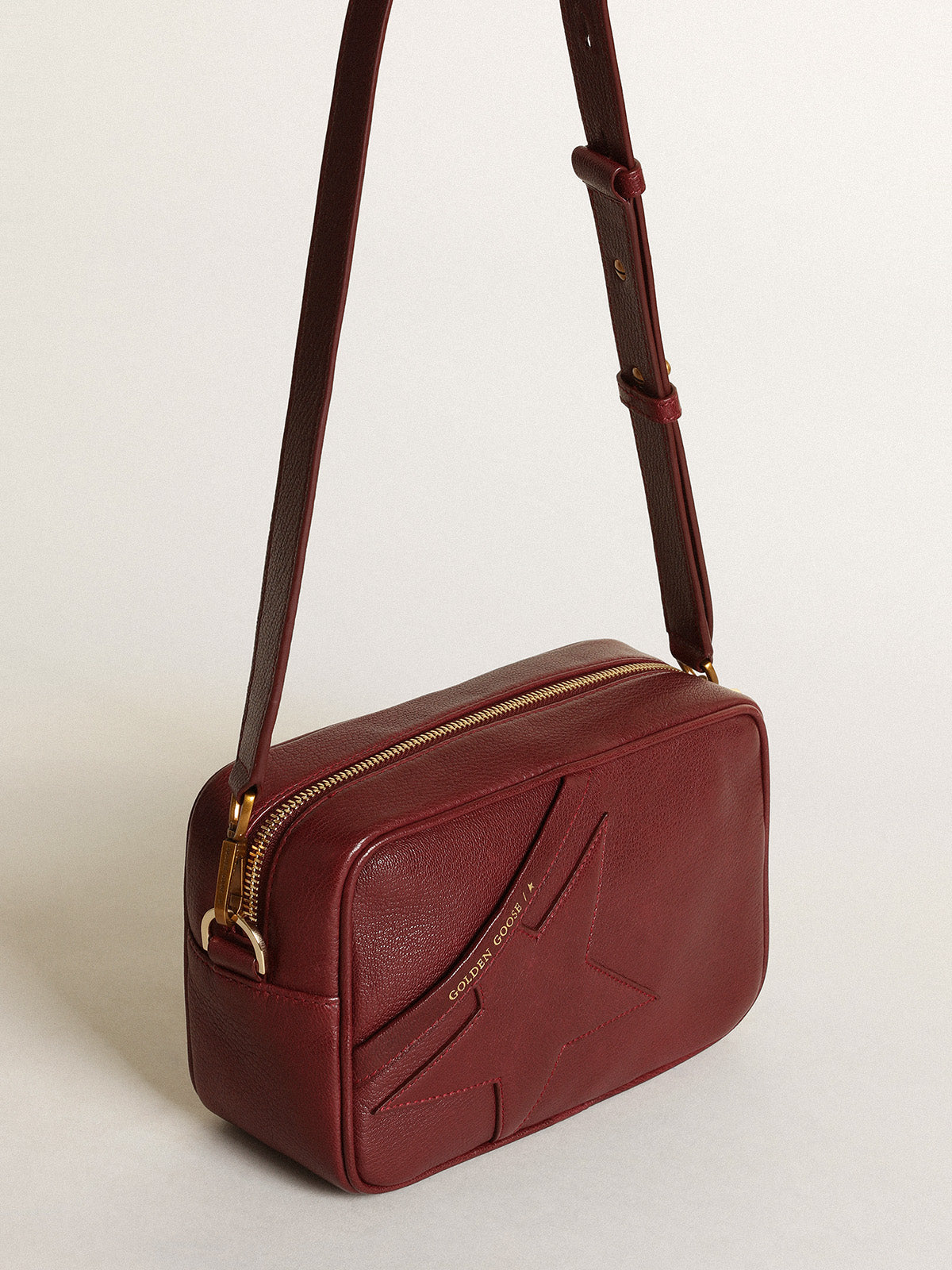 Women's Star Bag in burgundy leather with tone-on-tone star| Golden Goose