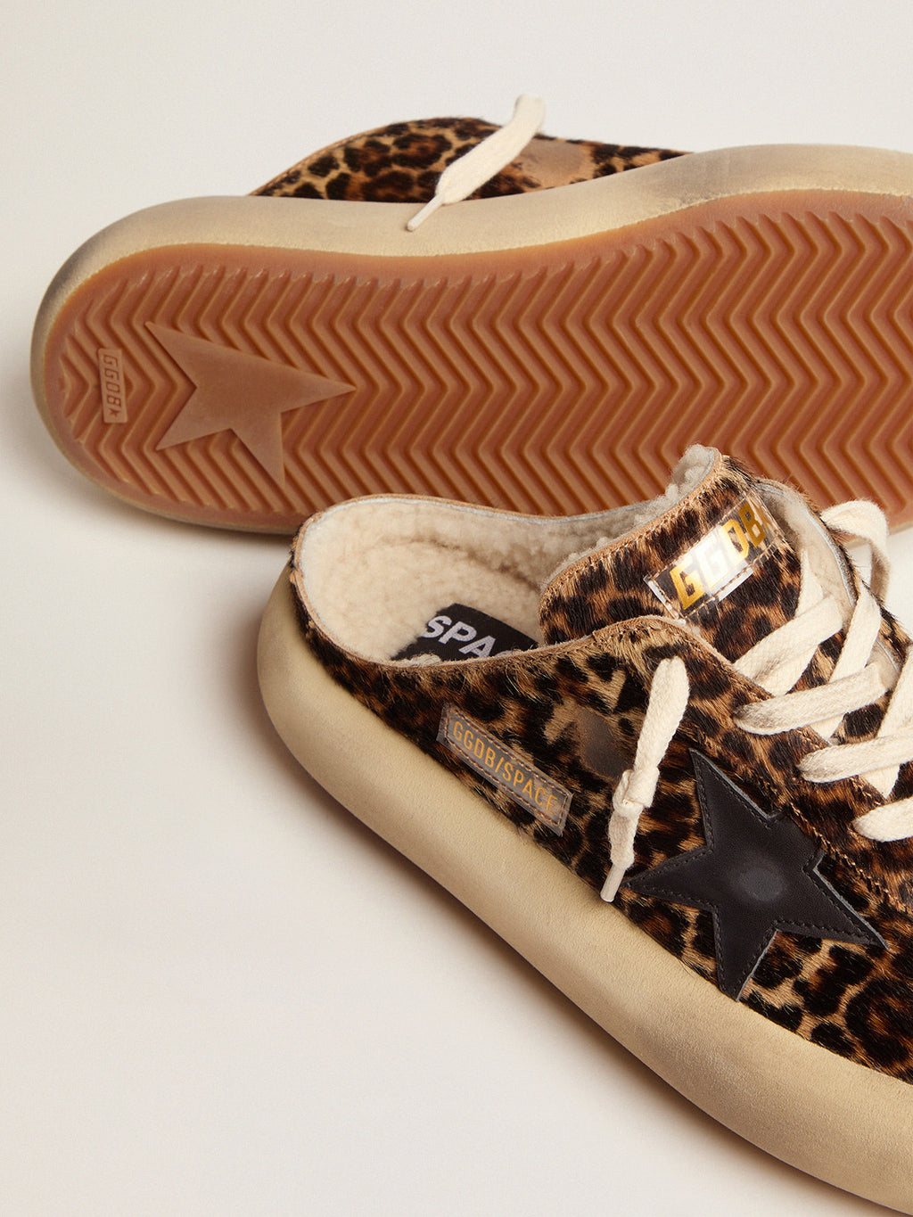 Women's Space-Star Sabot in animal print pony skin and shearling lining| Golden Goose