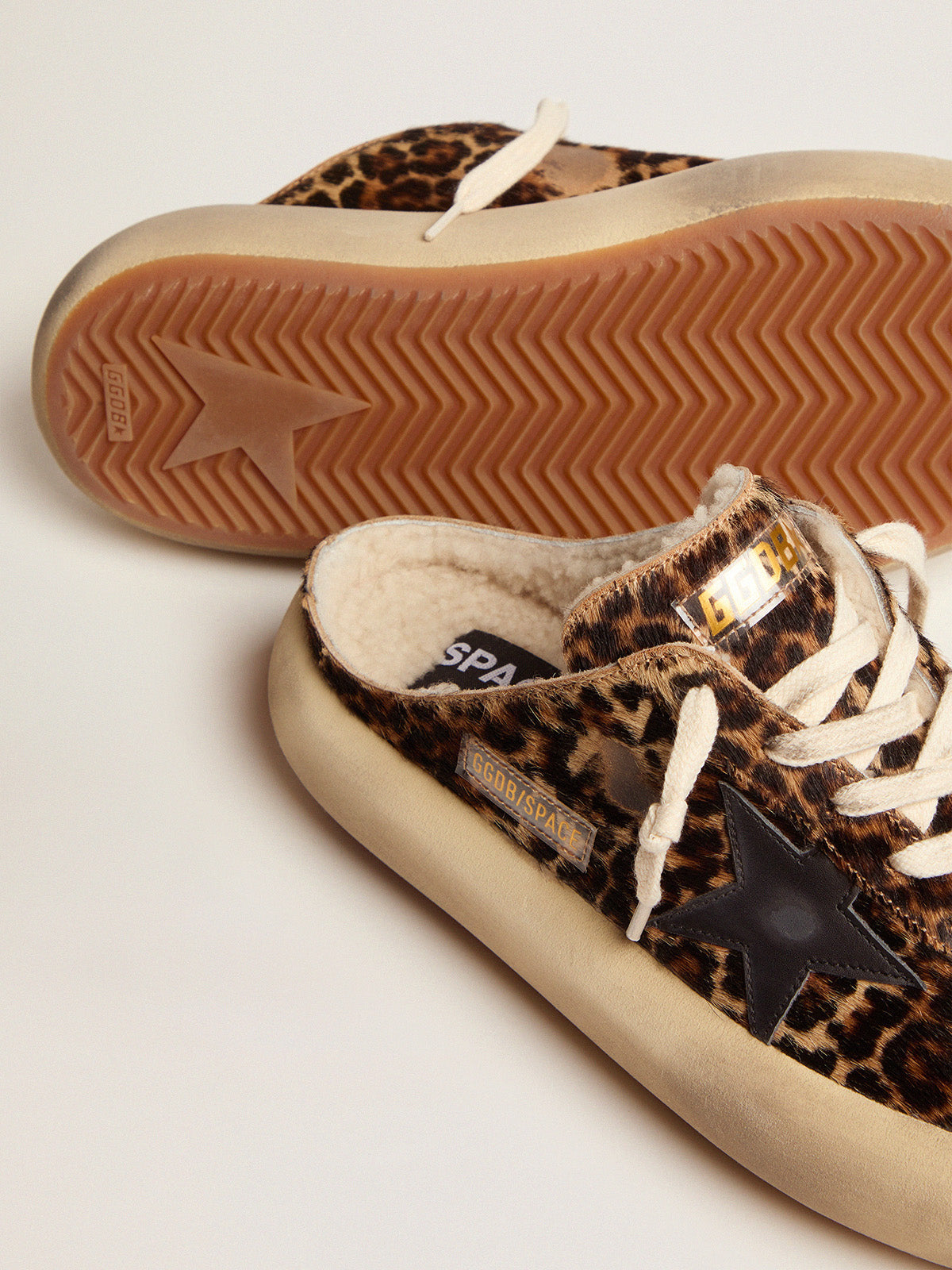 Women's Space-Star Sabot in animal print pony skin and shearling lining| Golden Goose