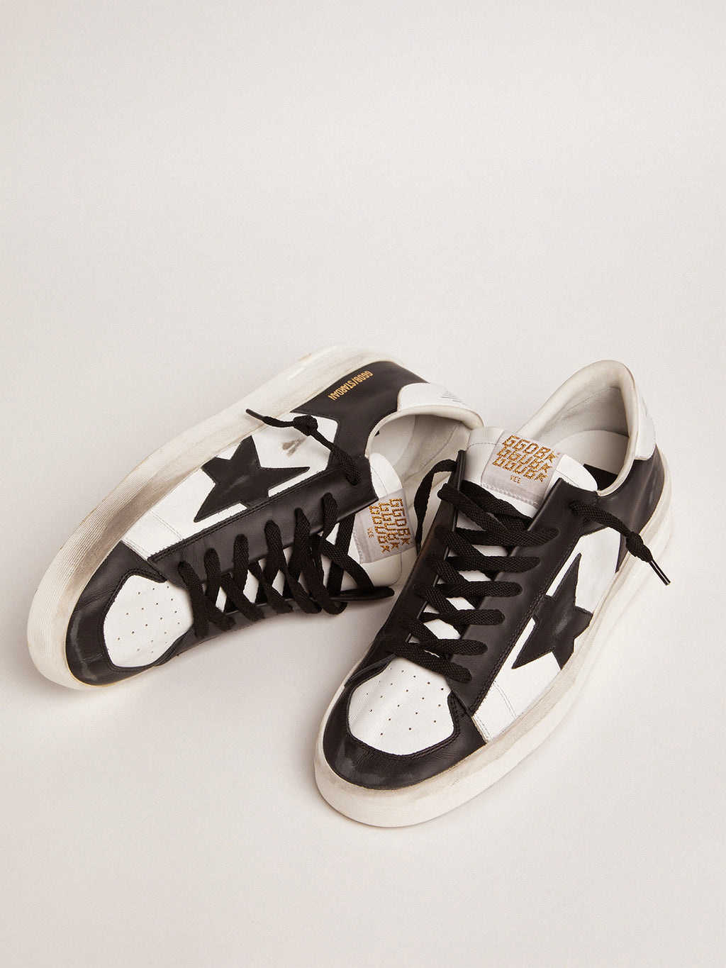 Women's Stardan sneakers in black and white leather| Golden Goose