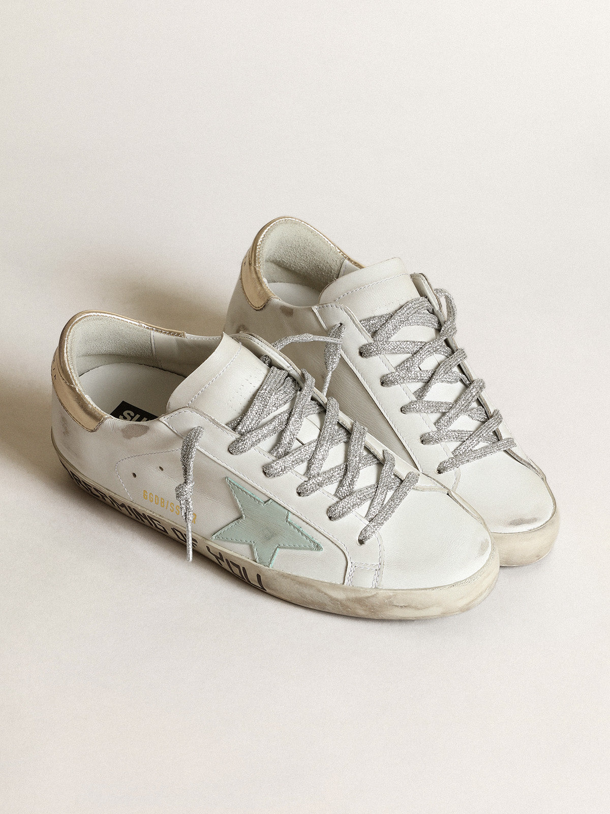 Super-Star LTD with an aquamarine star and platinum heel tab| Golden Goose