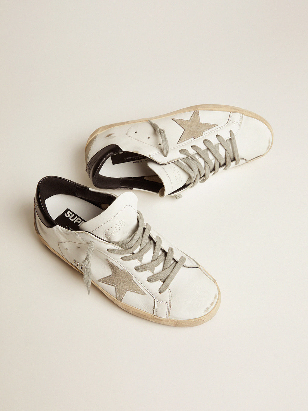 Women's Super-Star with black heel tab and metal stud lettering| Golden Goose