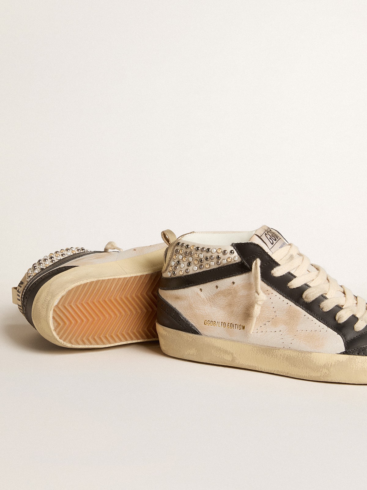 Women's Mid Star LTD in black and white leather with pearls and perforated star| Golden Goose