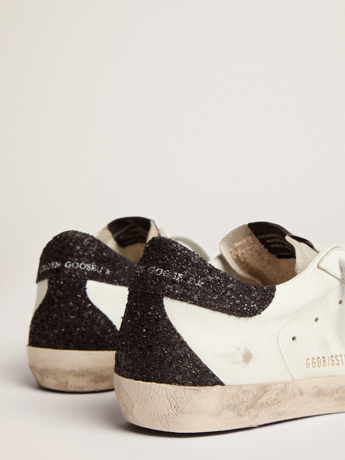 Women's Super-Star with gold star and black glitter heel tab| Golden Goose