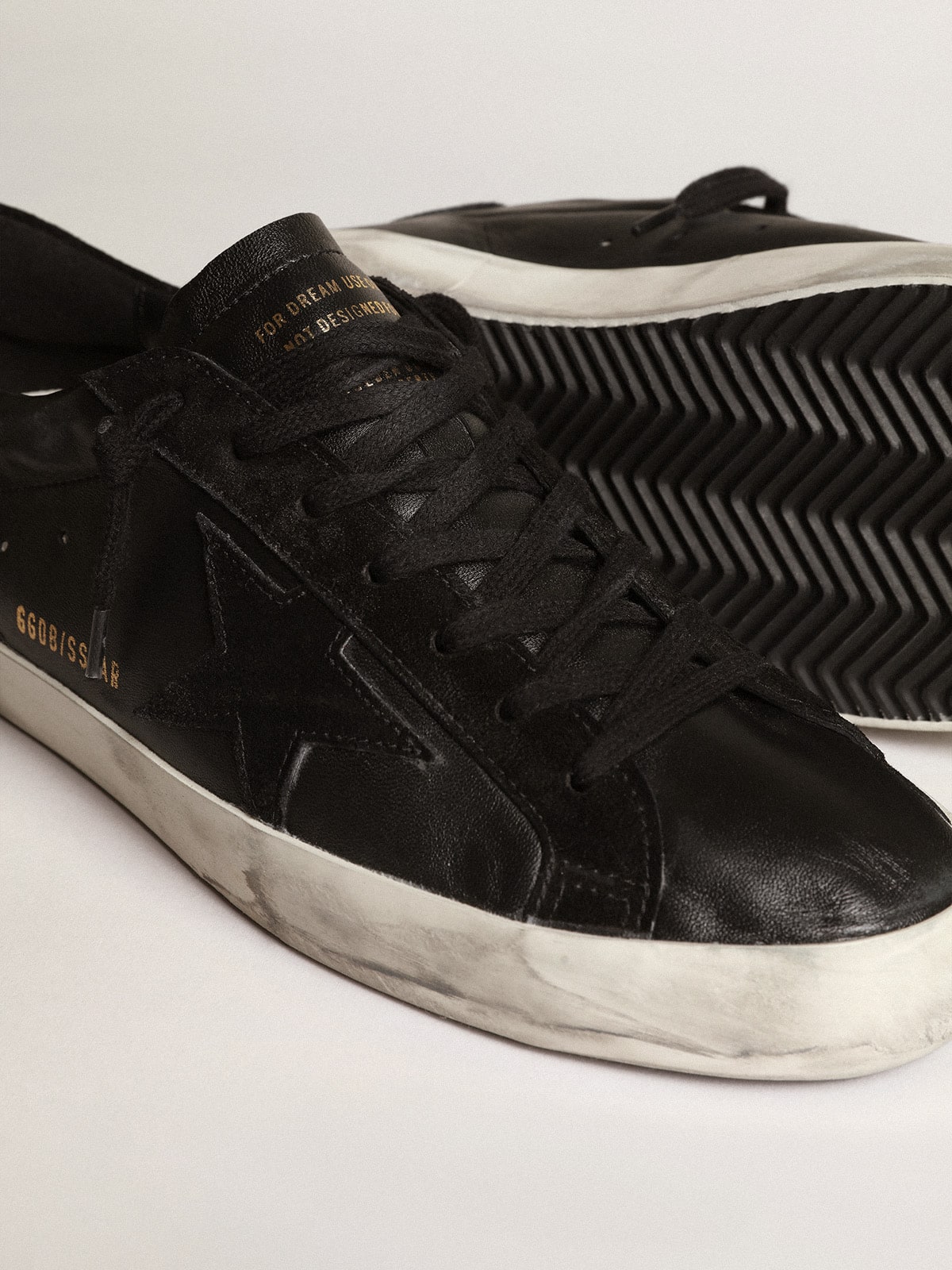 Men's Super-Star in black nappa with black suede star and heel tab| Golden Goose