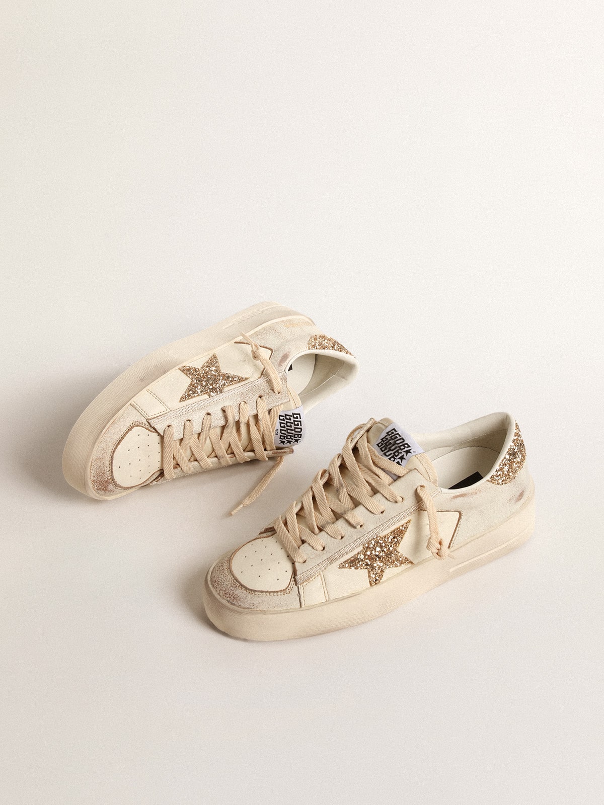 Women's Stardan in ecru nappa leather with gold glitter star and heel tab| Golden Goose