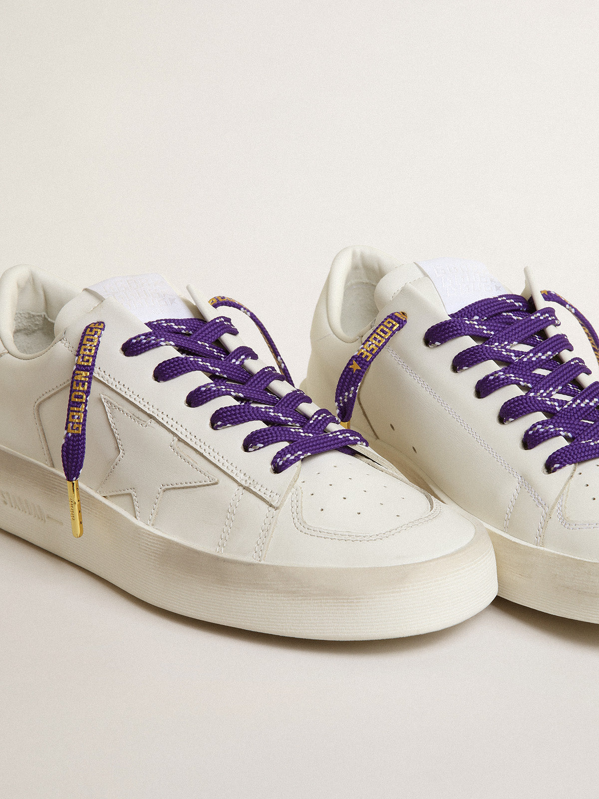 Purple laces with decorations and contrasting gold-colored logo| Golden Goose
