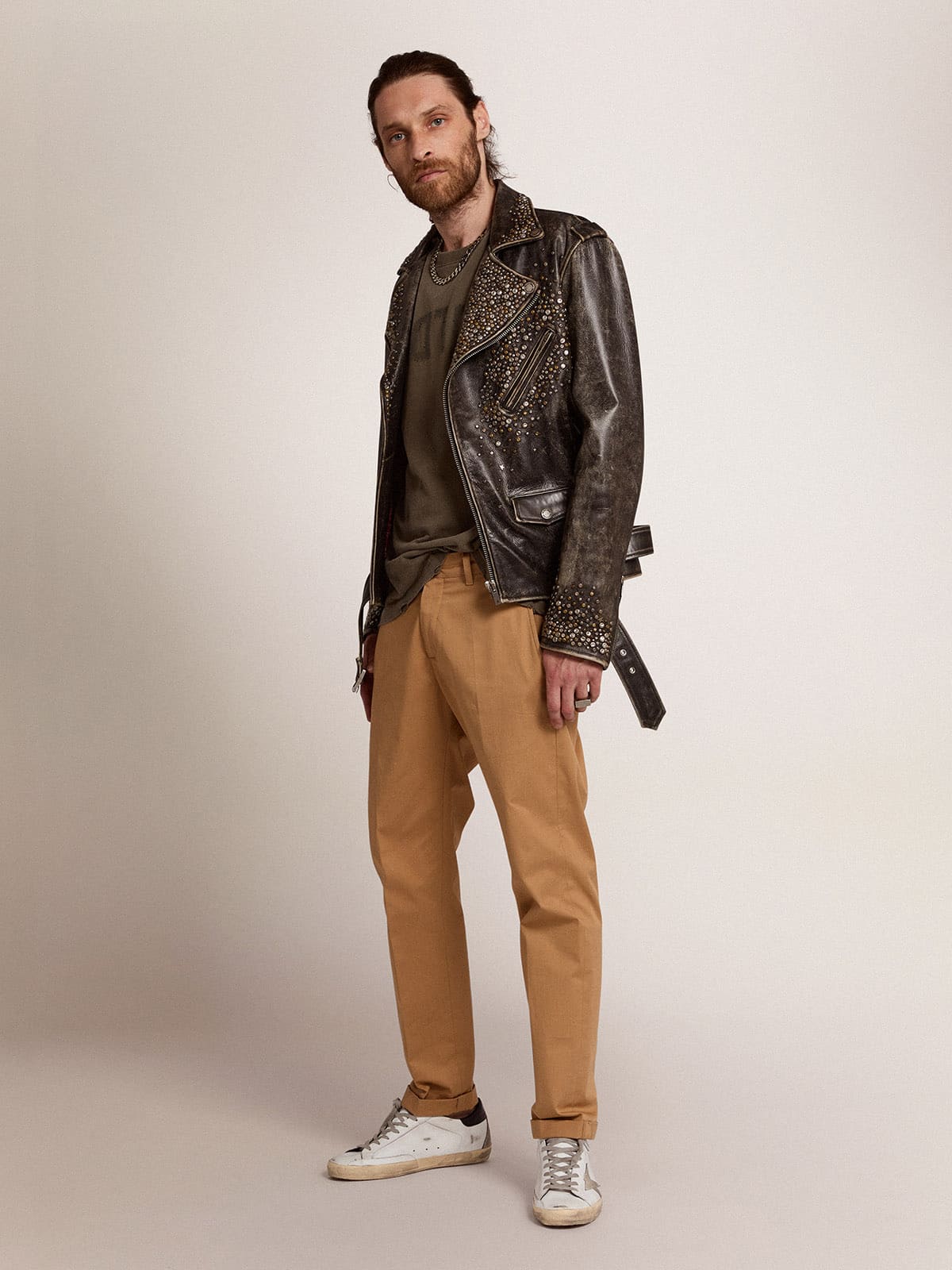 Men's leather biker jacket with hammered studs and adhesive tape| Golden Goose