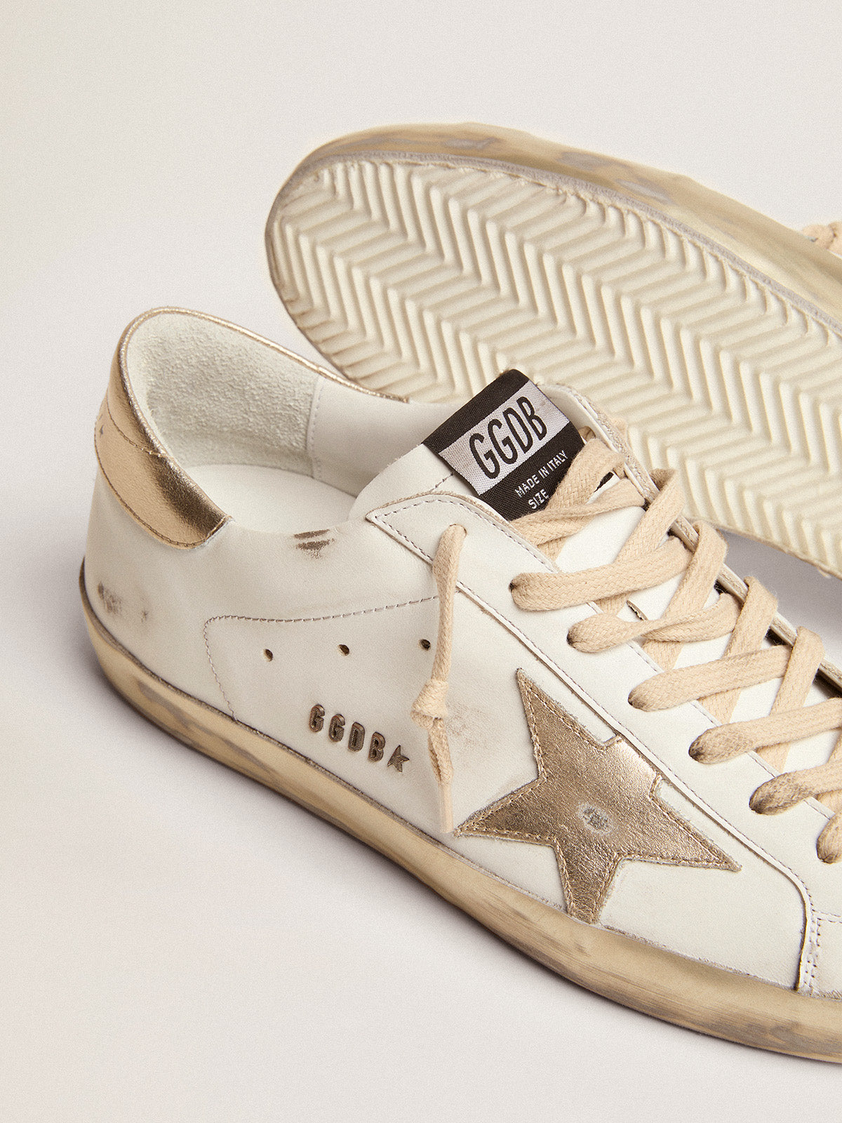 Men's Super-Star with gold sparkle foxing and lettering| Golden Goose