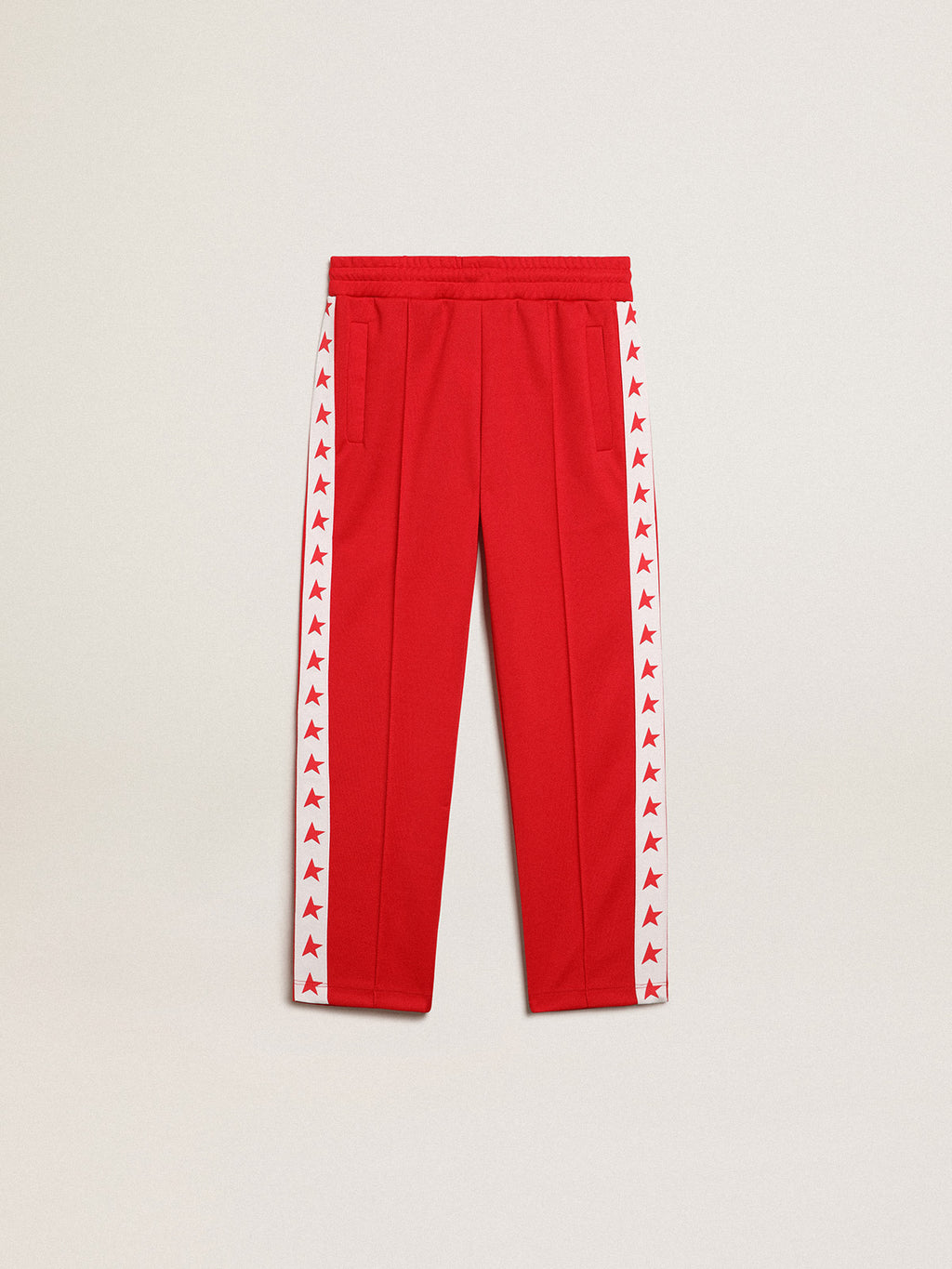 Red joggers with white stripe with contrasting red stars| Golden Goose