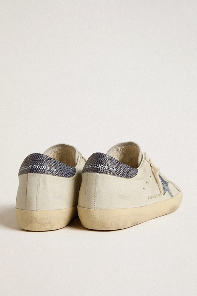Super-Star LTD with cream-colored leather star with Swarovski crystals and blue leather heel tab with lizard print| Golden Goose