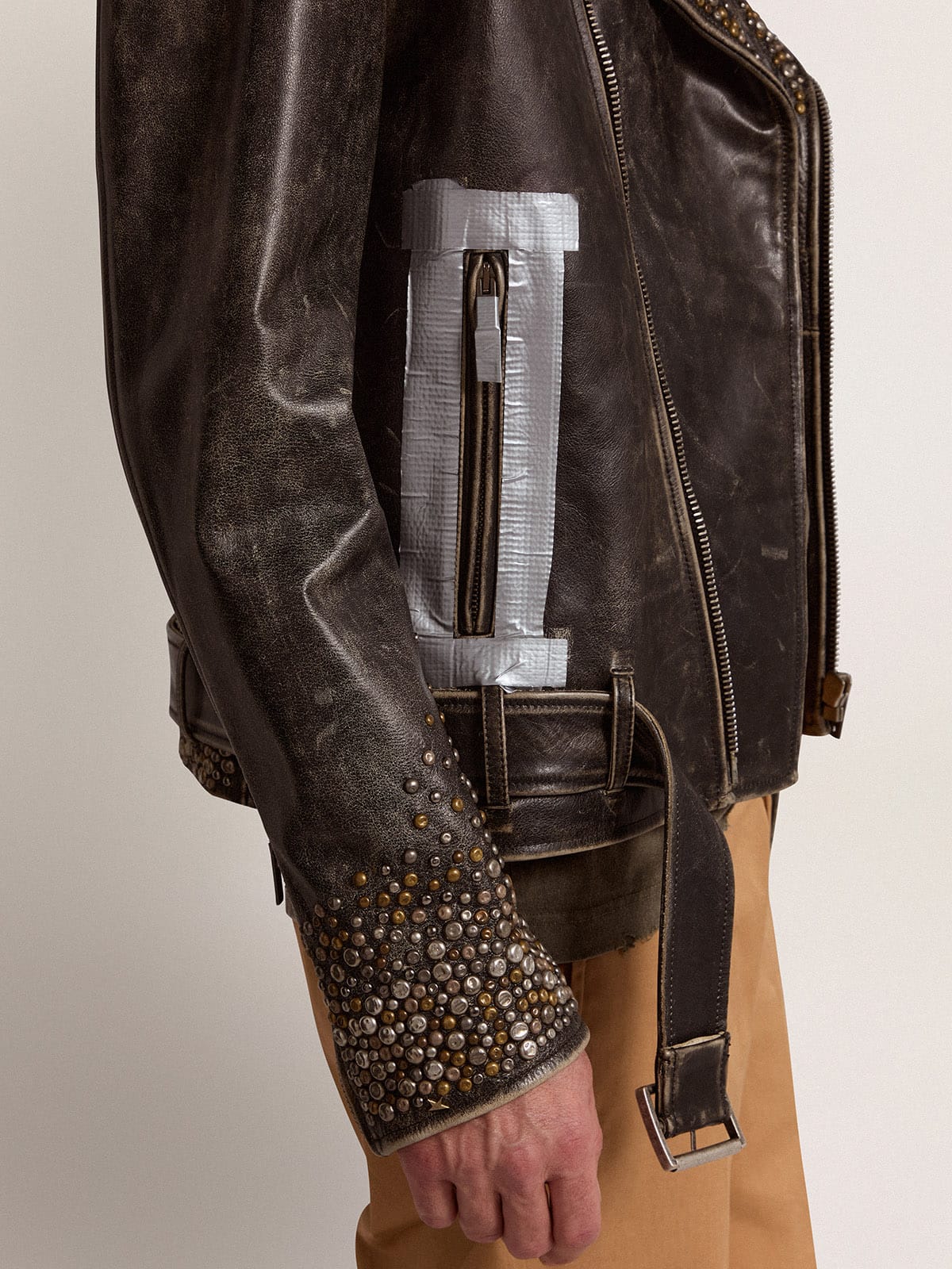 Men's leather biker jacket with hammered studs and adhesive tape| Golden Goose