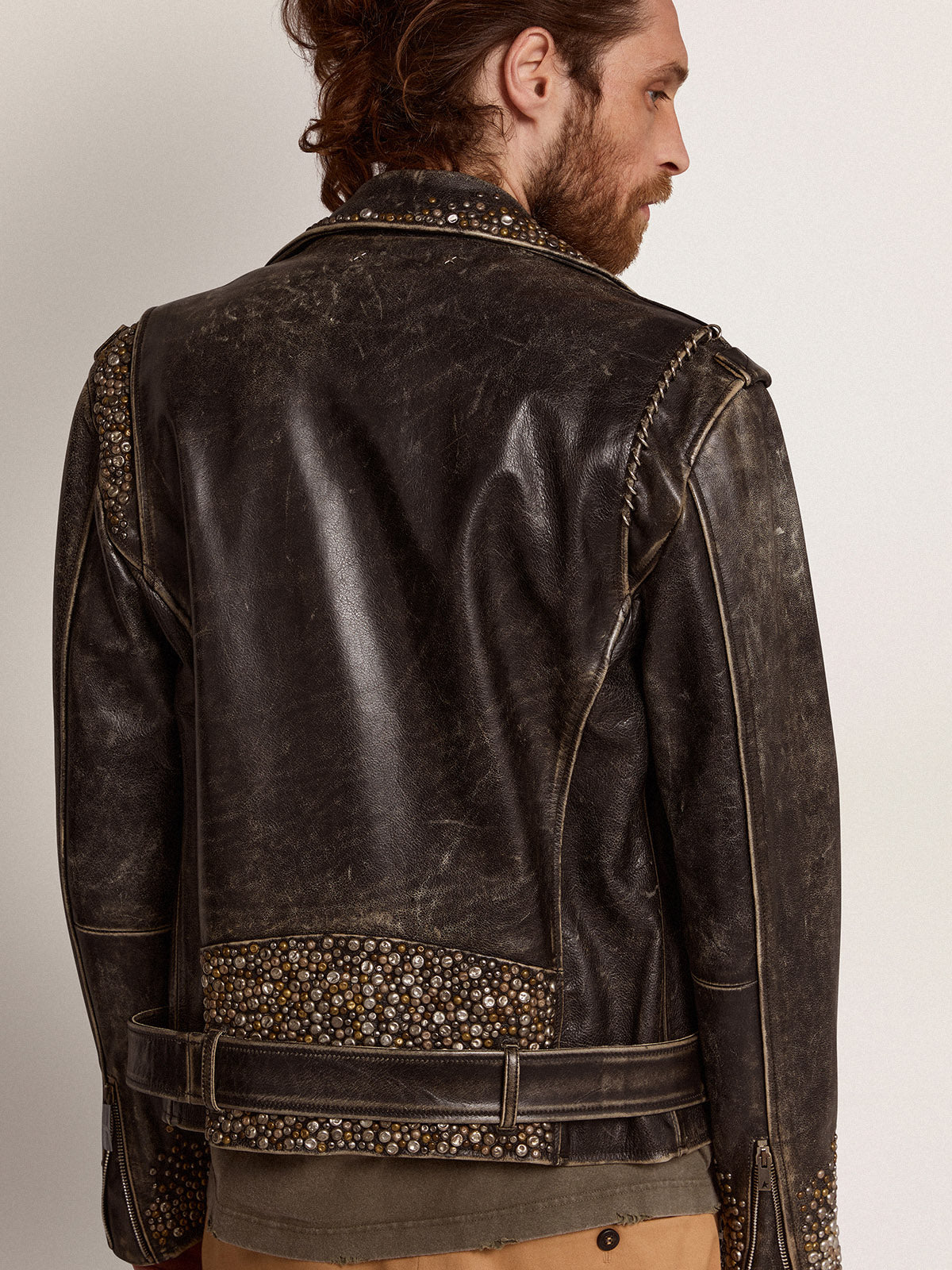 Men's leather biker jacket with hammered studs and adhesive tape| Golden Goose