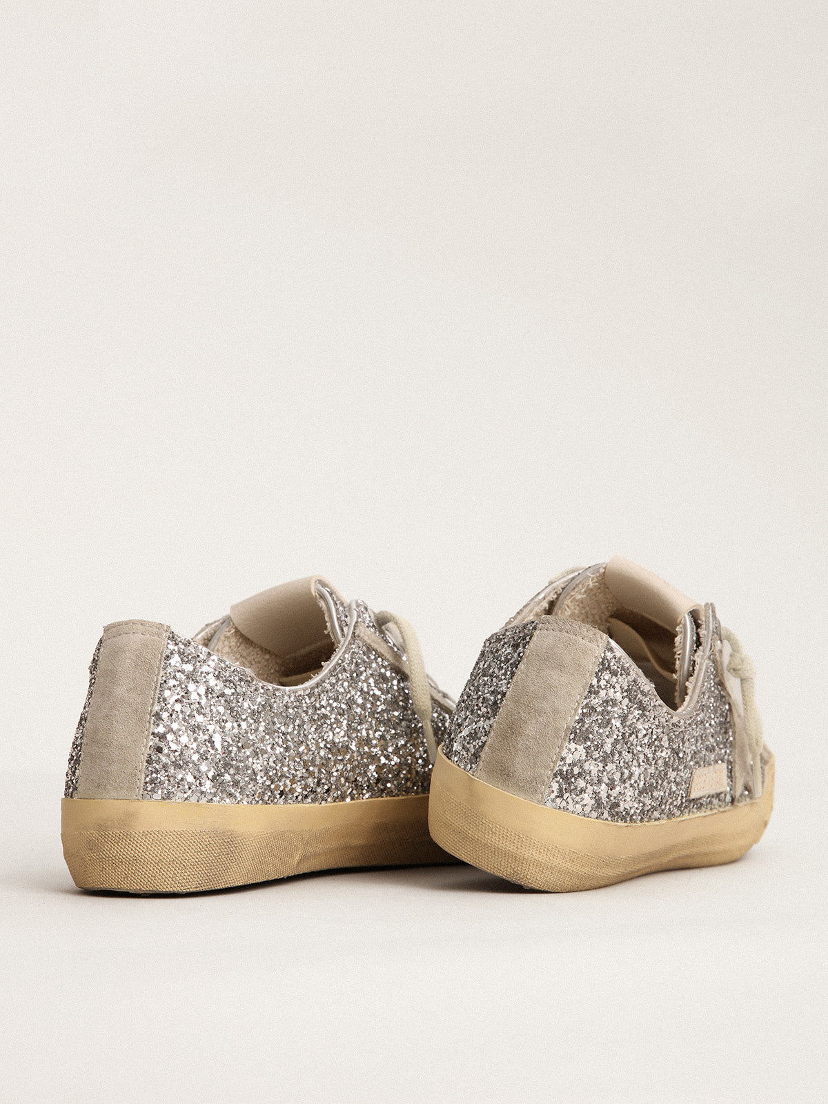 Women's V-Star LTD in silver glitter with ice-gray suede star| Golden Goose