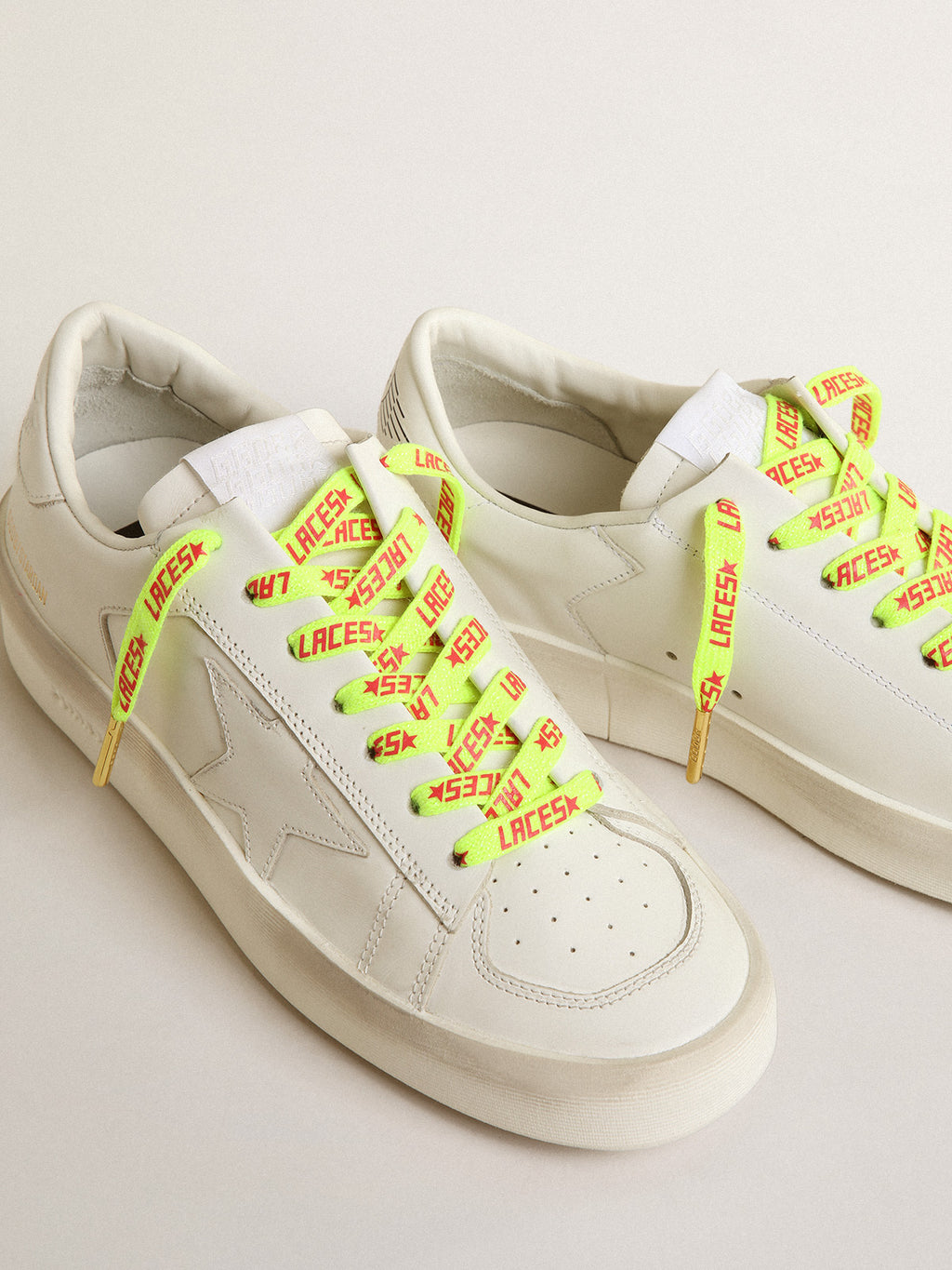 Fluorescent yellow laces with contrasting orange 'Laces' lettering| Golden Goose