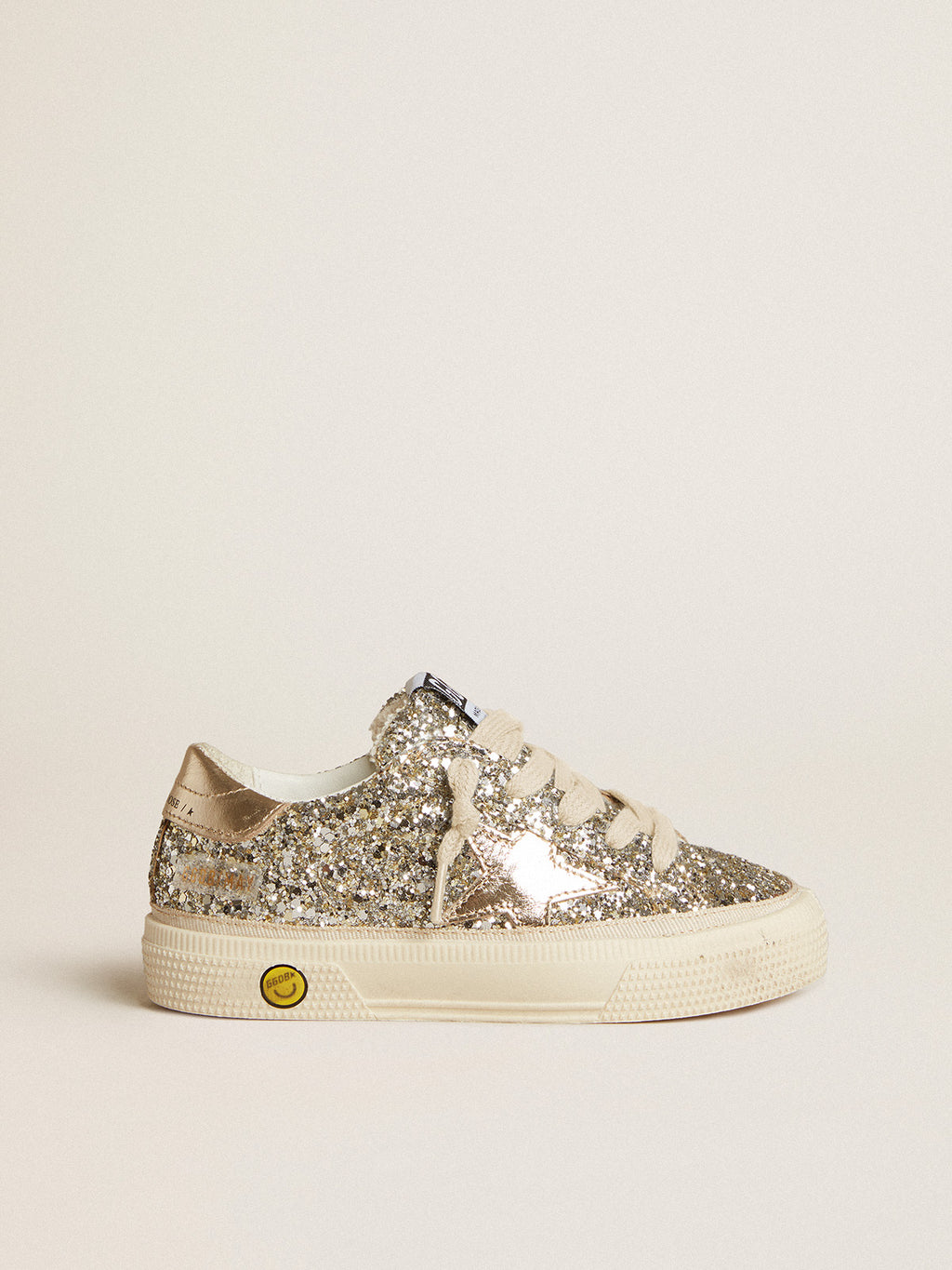 May Young in platinum glitter with metallic leather star and heel tab| Golden Goose