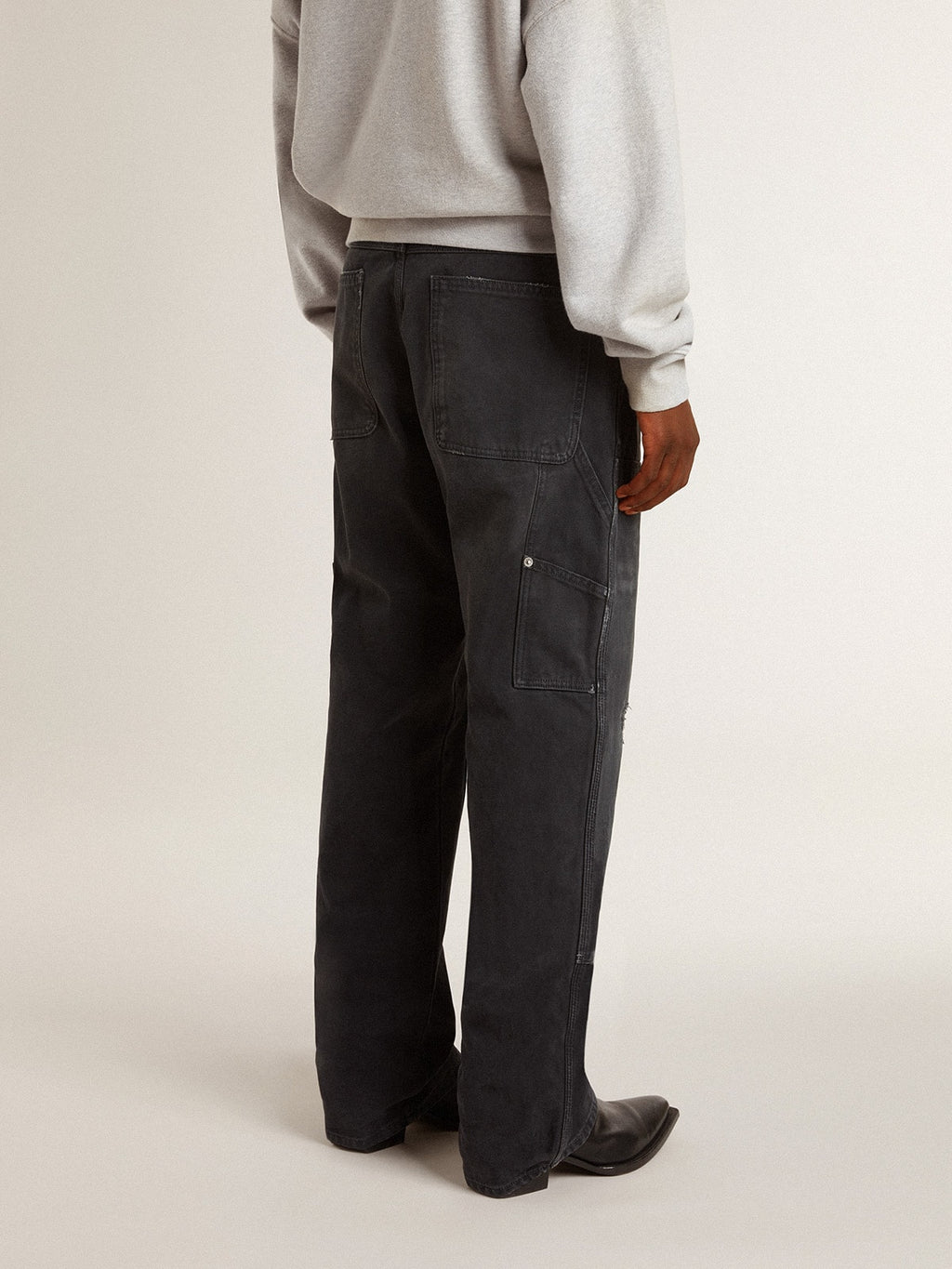 Men's distressed black cotton jeans with front patches| Golden Goose