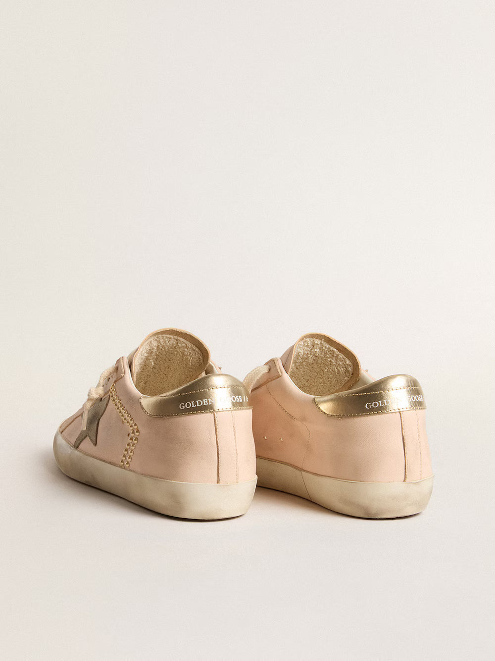 Super-Star in pink nappa with ice-gray star and platinum heel tab| Golden Goose