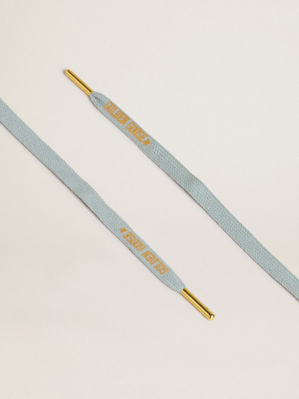 Light-blue cotton laces with contrasting gold-colored logo| Golden Goose