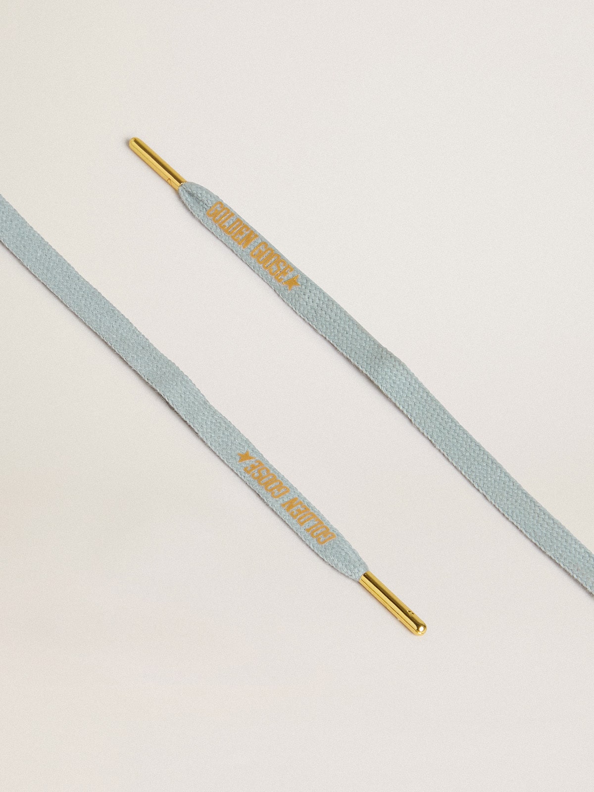 Light-blue cotton laces with contrasting gold-colored logo| Golden Goose
