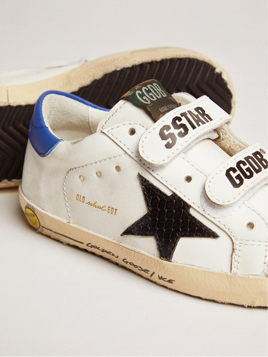Young Old School with black snake print leather star and blue heel| Golden Goose