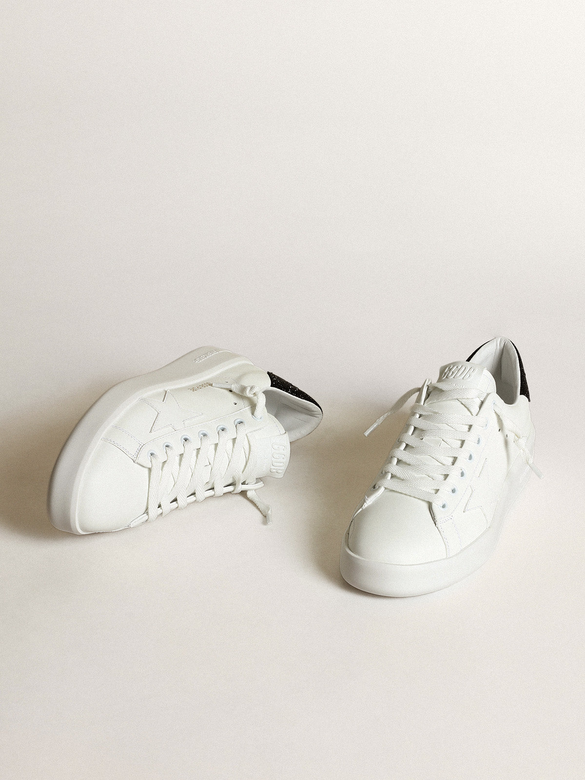 Purestar sneakers in white leather with tone-on-tone star and heel tab in black Swarovski crystals| Golden Goose