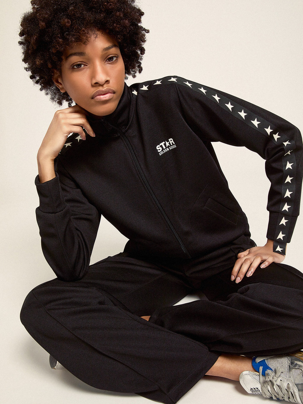 Women's black joggers with white stars on the sides| Golden Goose